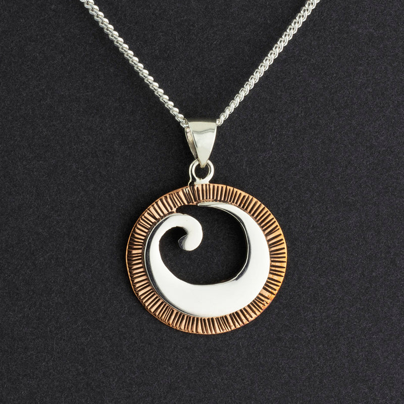 handmade silver and copper snail shell pendant necklace