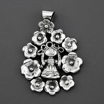lele doll Mexican silver pendant