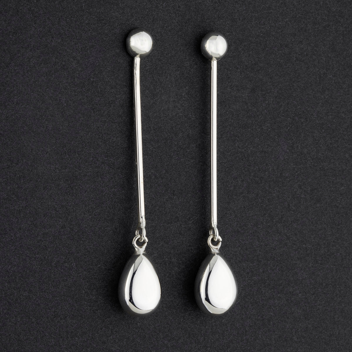 long sterling silver pendulum post dangle earrings