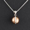 silver and copper ball pendant necklace