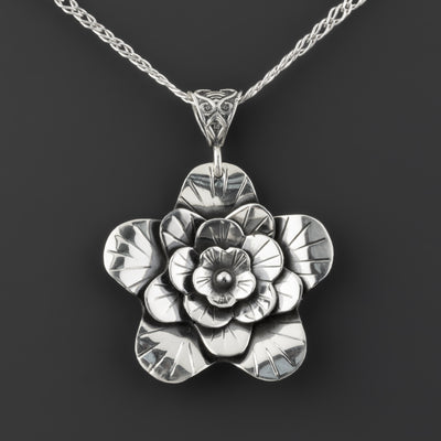 Taxco sterling silver floral pendant