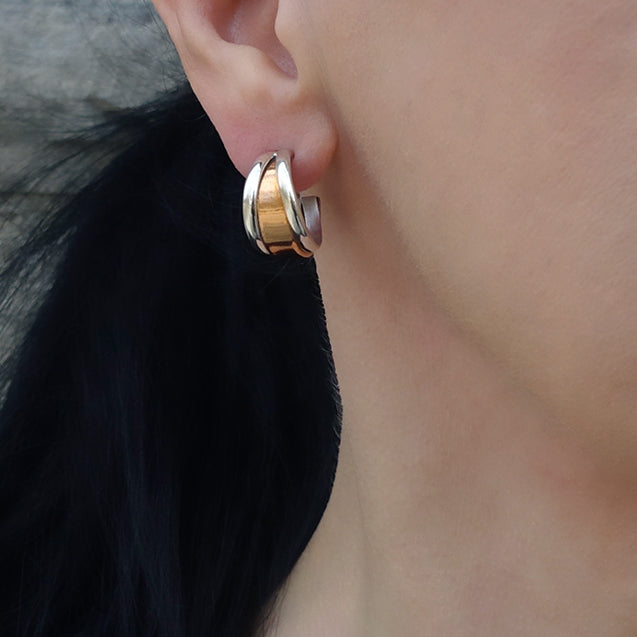 silver and copper rimmed hoop earrings