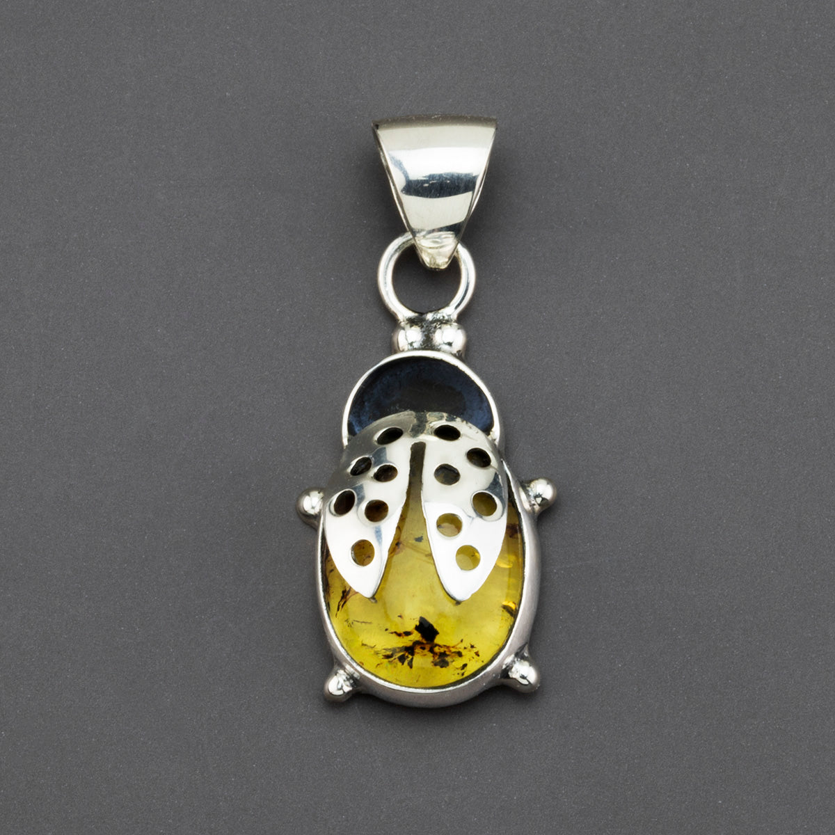 amber ladybug pendant