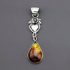 amber milagros Mexican pendant