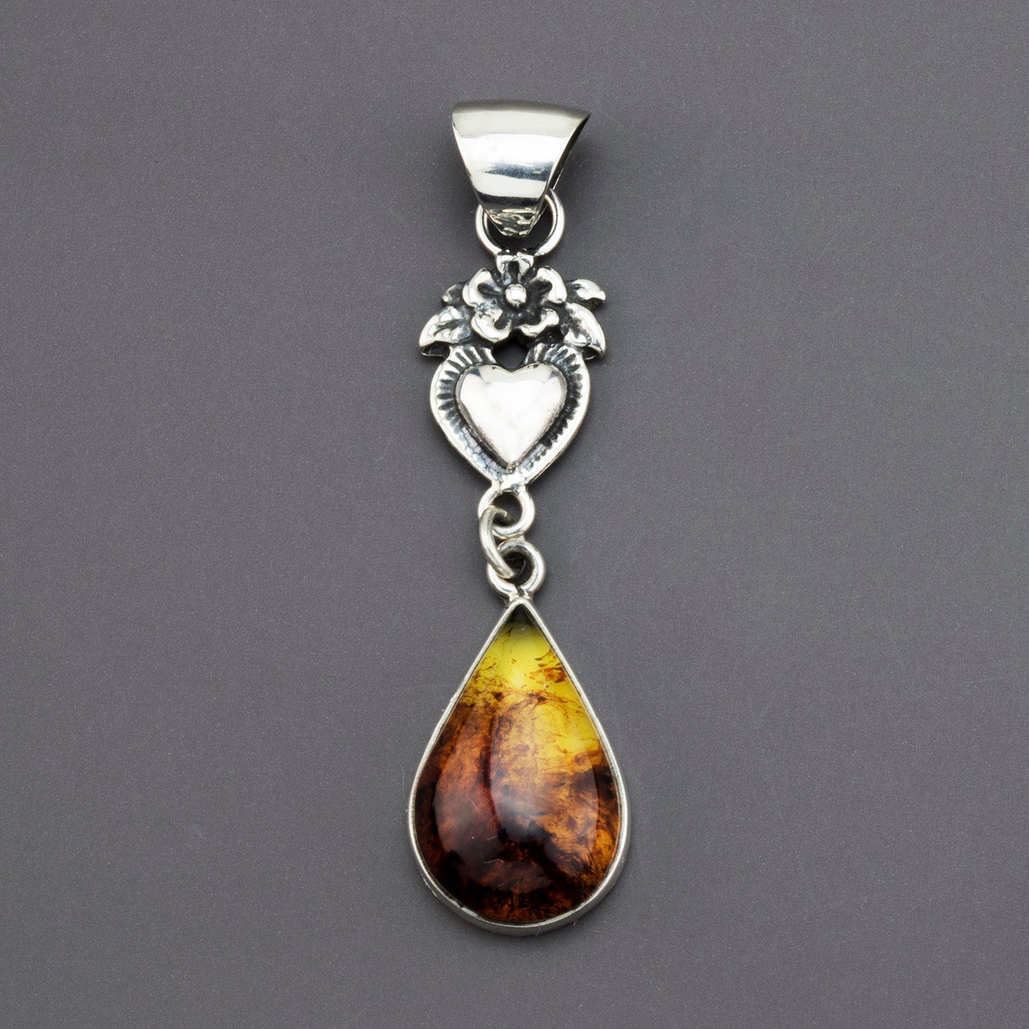 amber milagros Mexican pendant