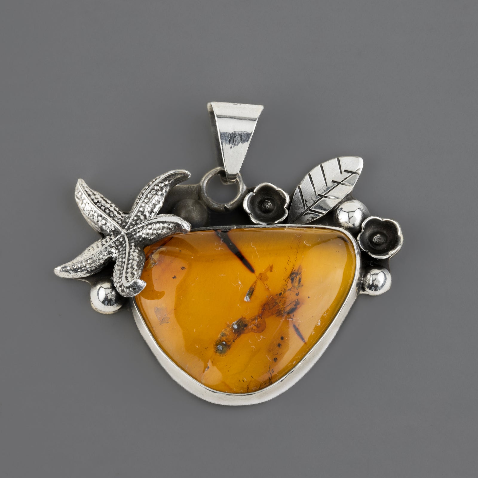Sea Treasure Amber Pendant