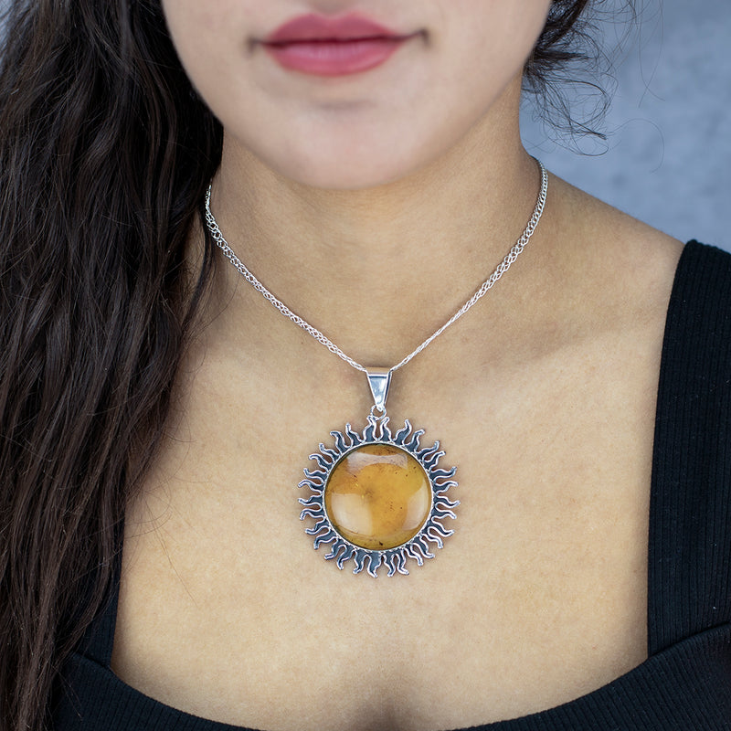 large amber sun pendant