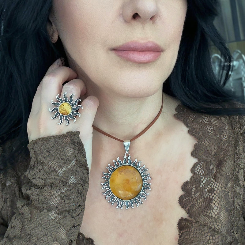 large amber sun pendant