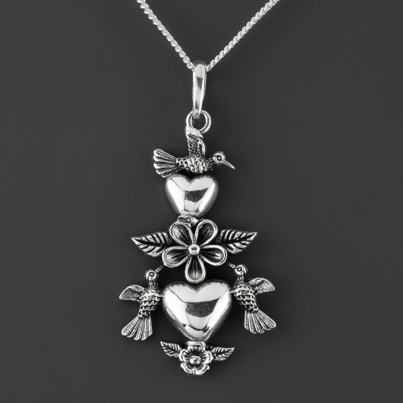 frida inspired hummingbirds and hearts pendant