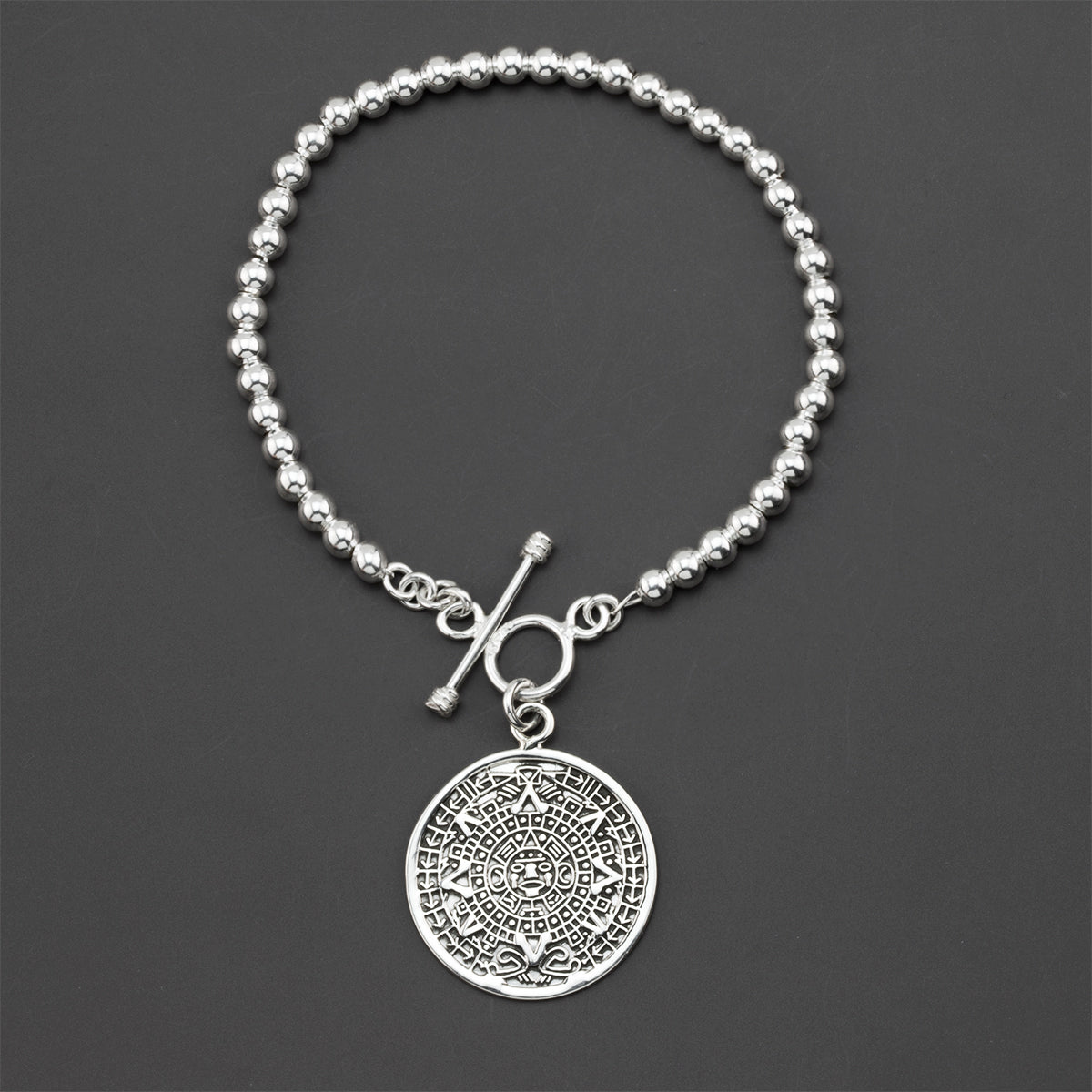 Aztec calendar charm bracelet