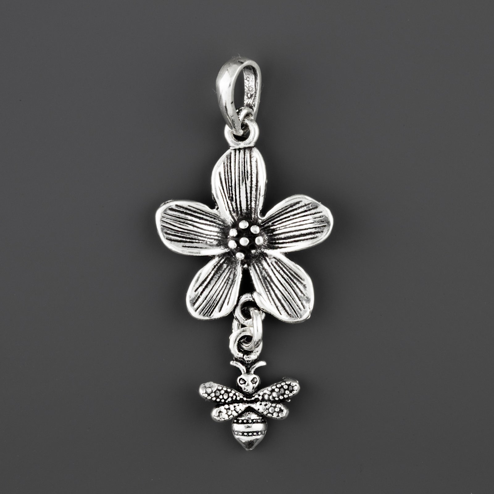 bee in bloom handmade silver pendant