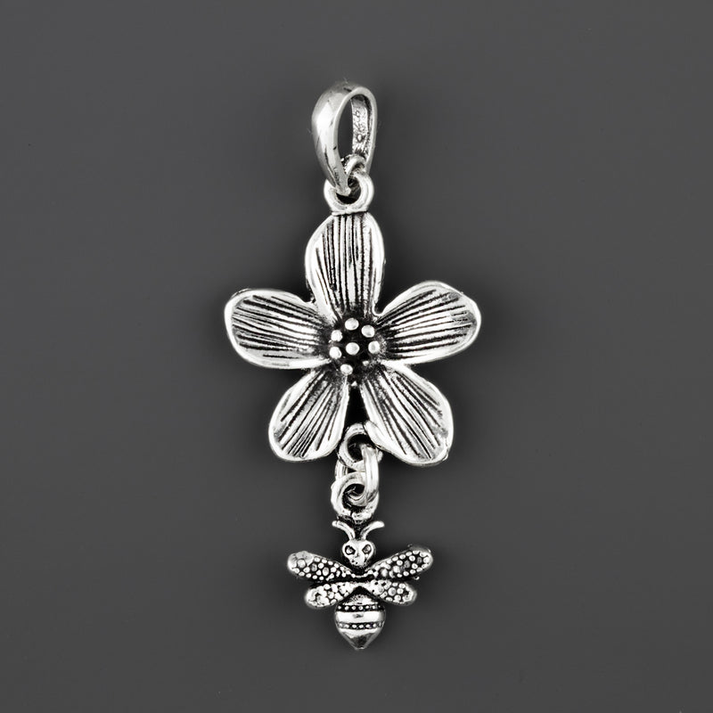 bee in bloom handmade silver pendant