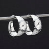 big hammered silver hoop earrings
