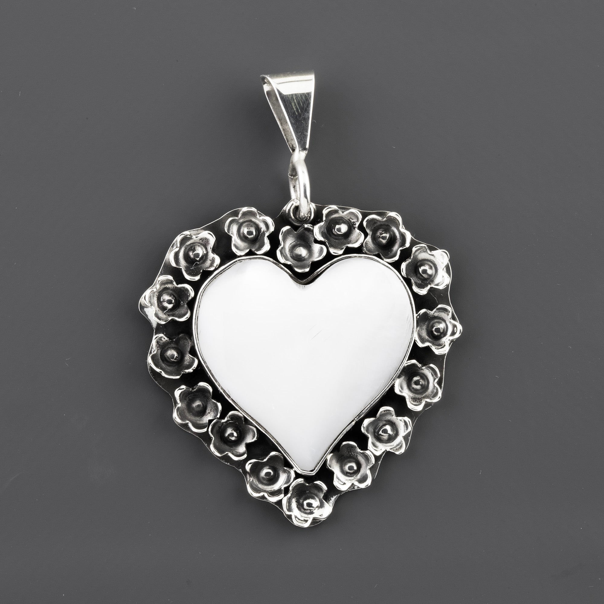 bloomed heart artisan silver pendant