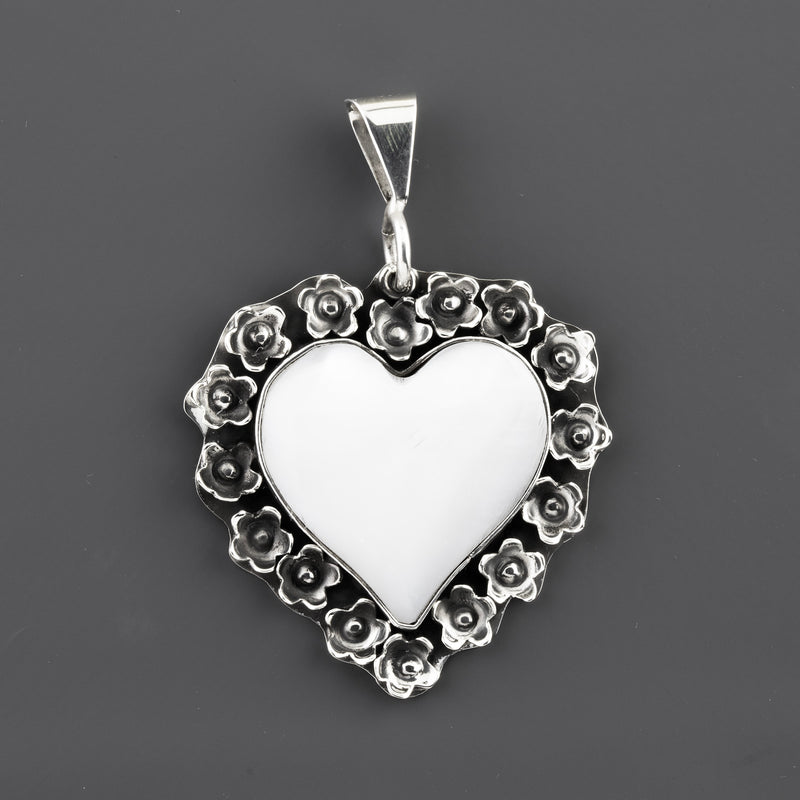 bloomed heart artisan silver pendant