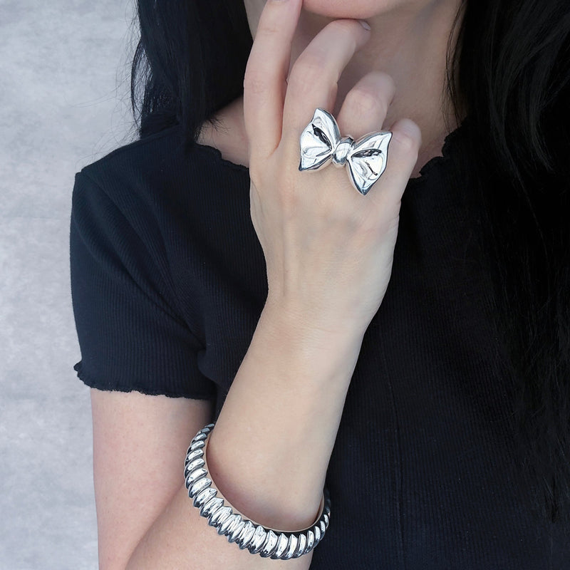 power bow sterling silver ring