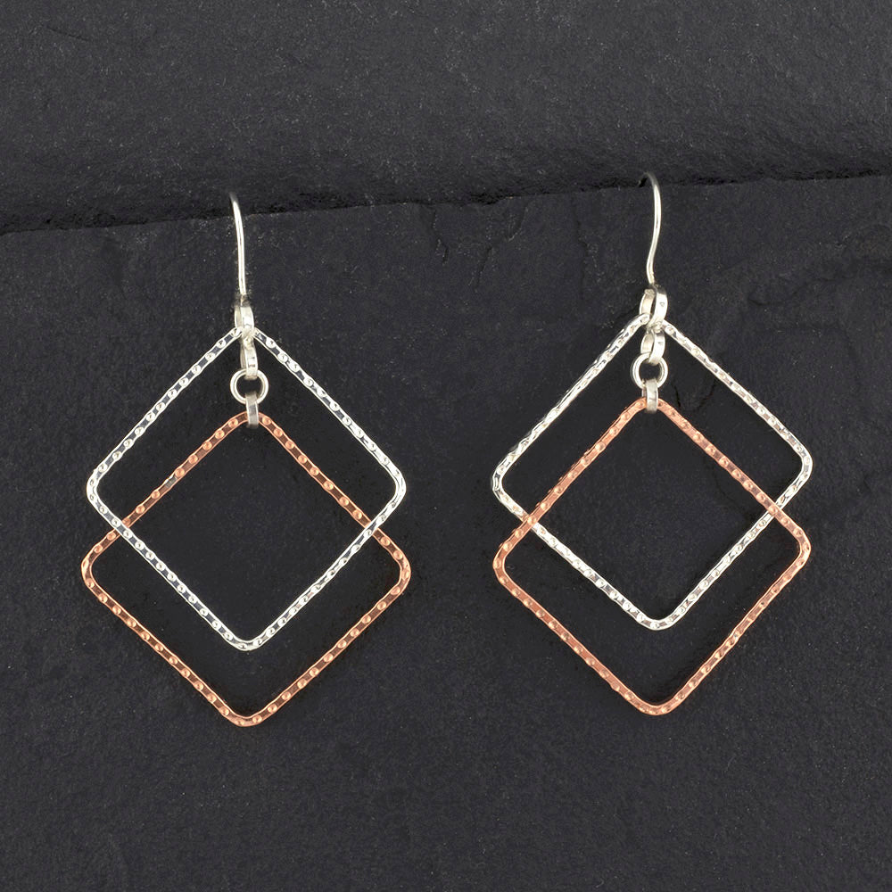 copper and silver geometric dangle earrings