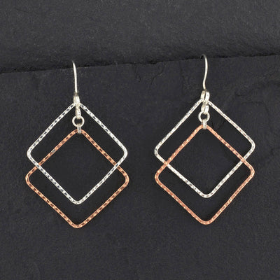 copper and silver geometric dangle earrings