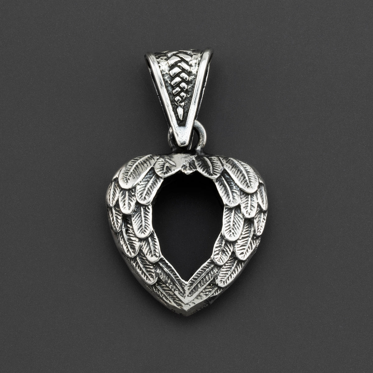 corazon alado Mexican silver pendant