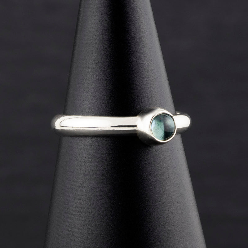 dainty sterling silver and blue topaz ring