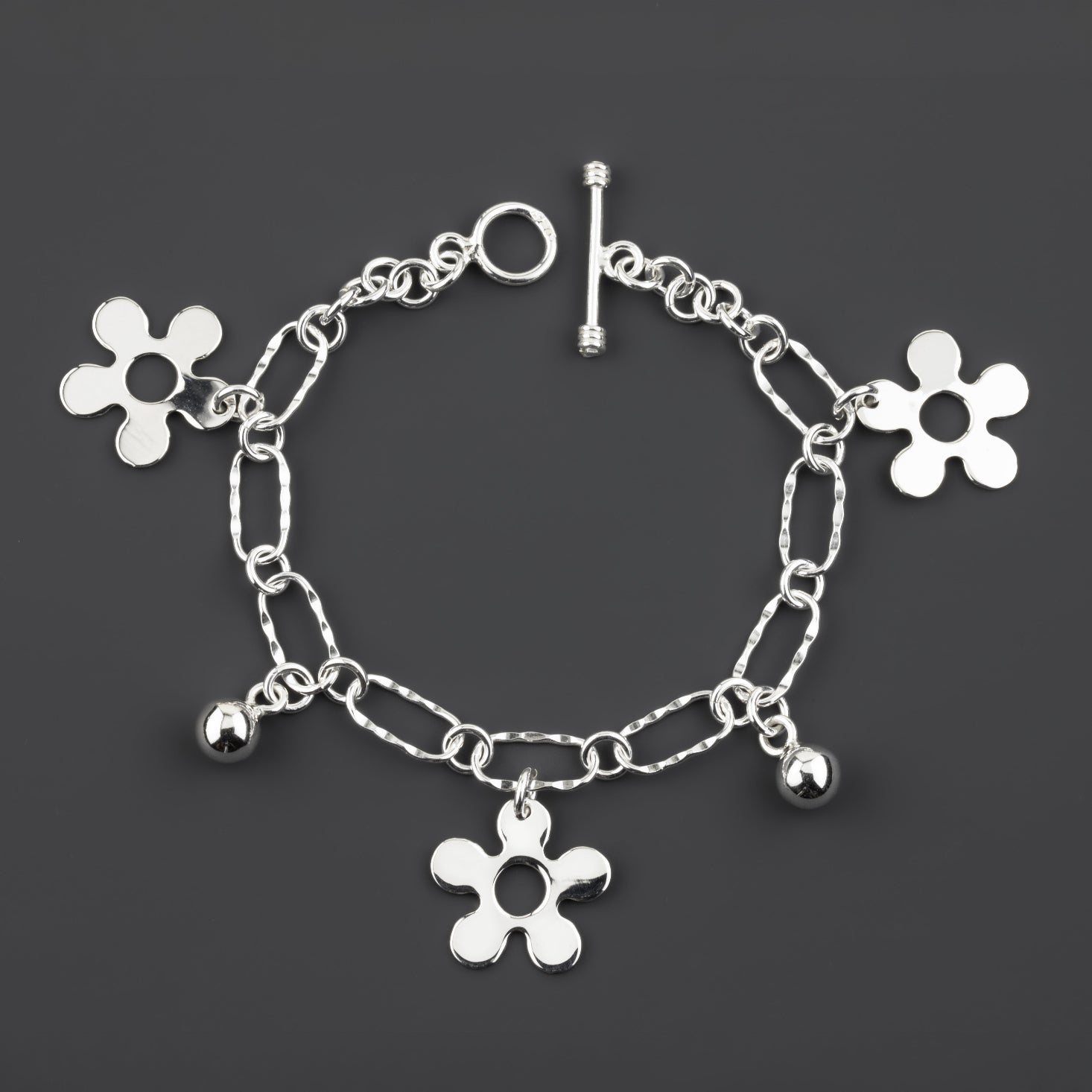 daisy charm sterling silver bracelet