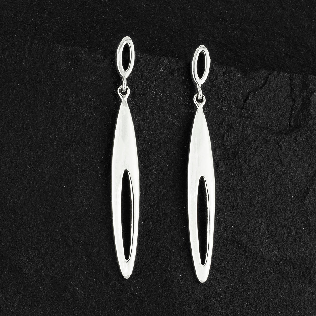 elongated sterling silver flame drop earrings