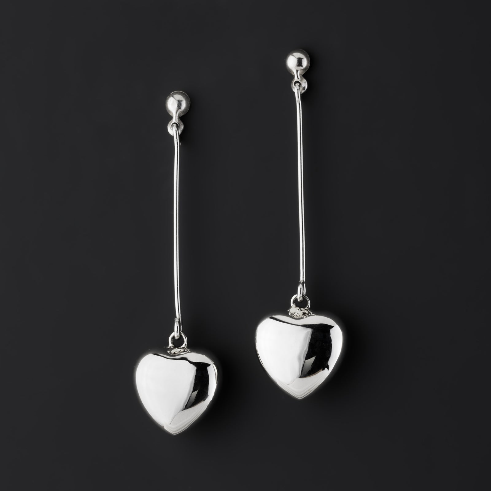 floating heart long silver earrings