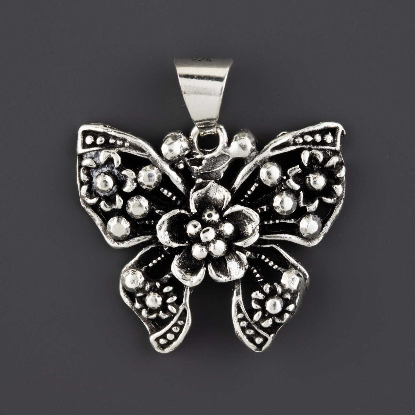 flor mariposa handmade silver pendant