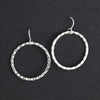hammered silver dangle hoop earrings