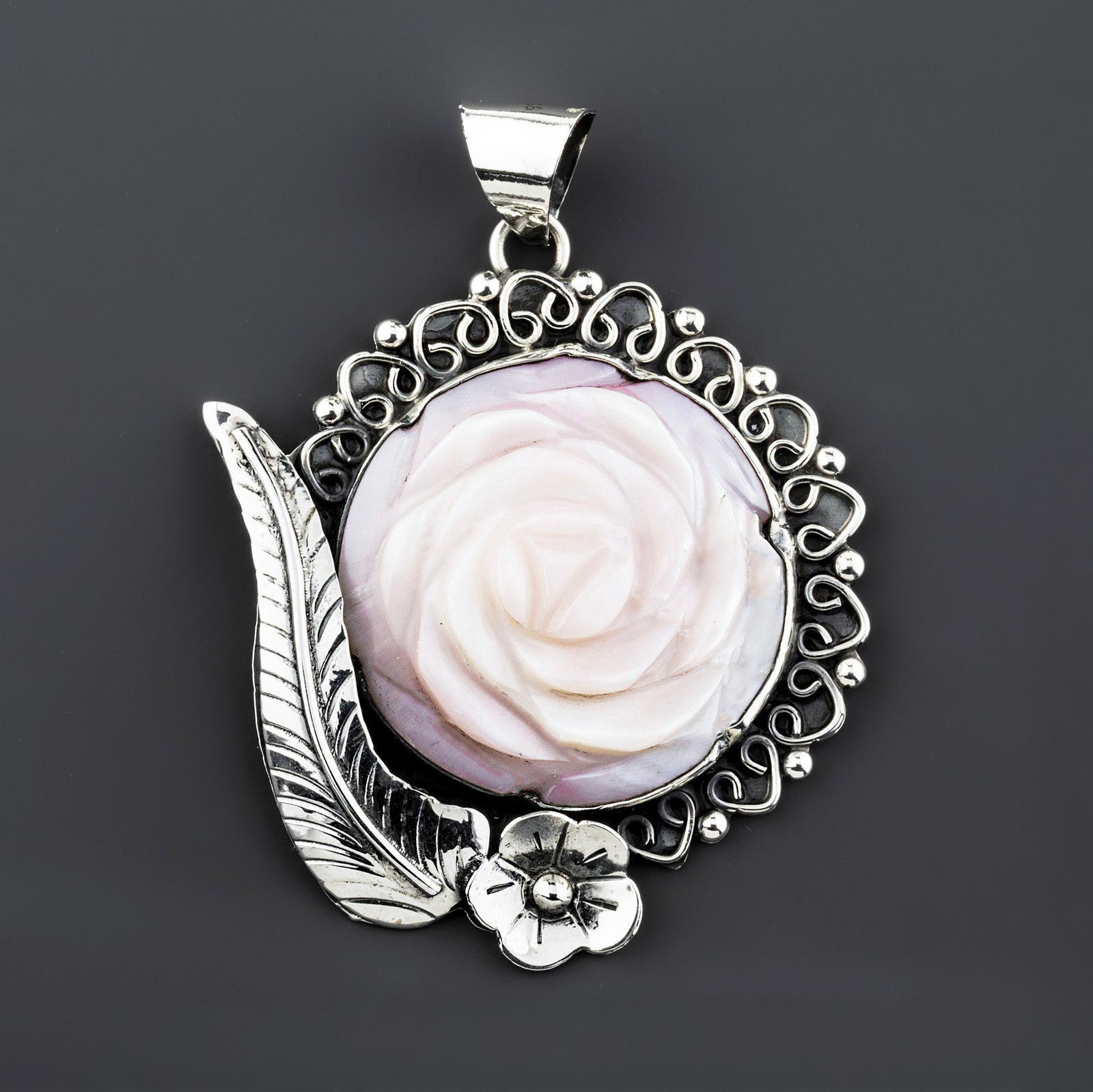 handcrafted mother of pearl carved rose pendant