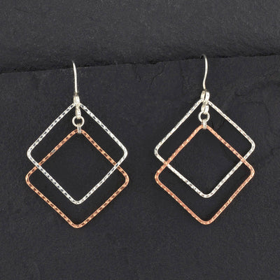 large copper and silver geometric dangle earrings