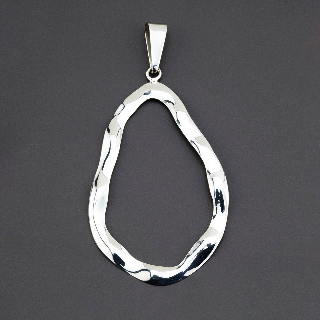 large sterling silver fluid frame pendant