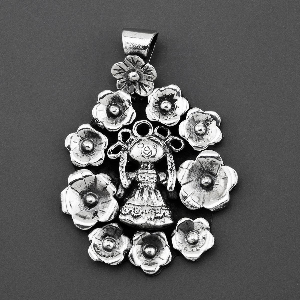 lele doll Mexican silver pendant