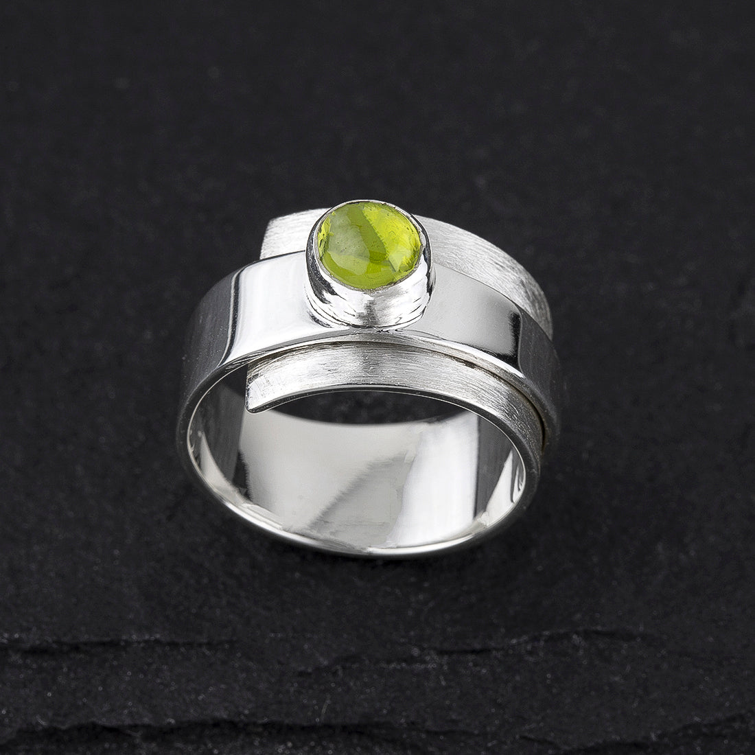 lime orbit peridot ring