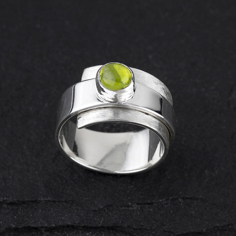 lime orbit peridot ring
