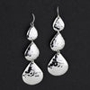 long hammered silver triple teardrop earrings