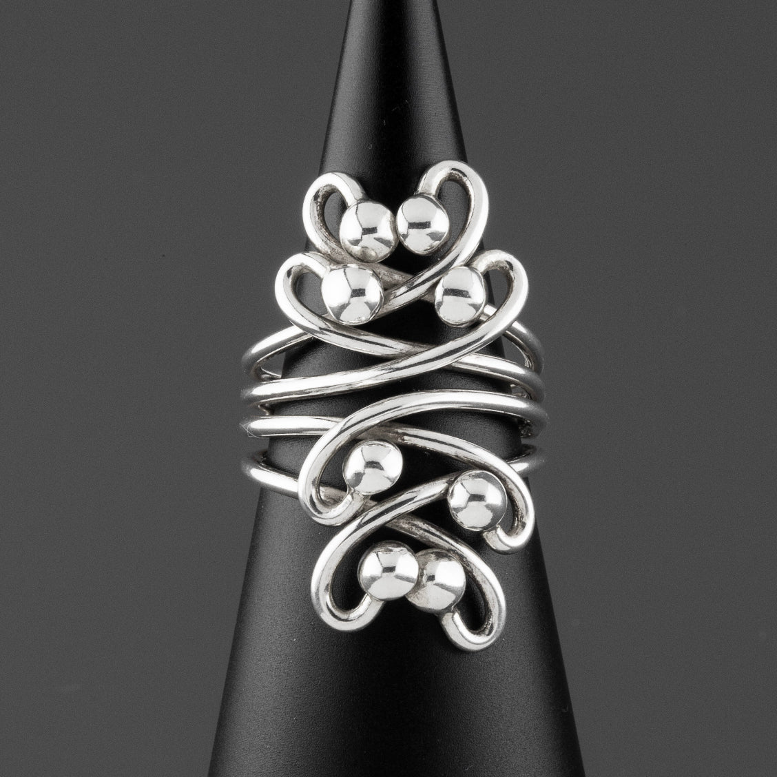 long sterling silver swirl statement ring
