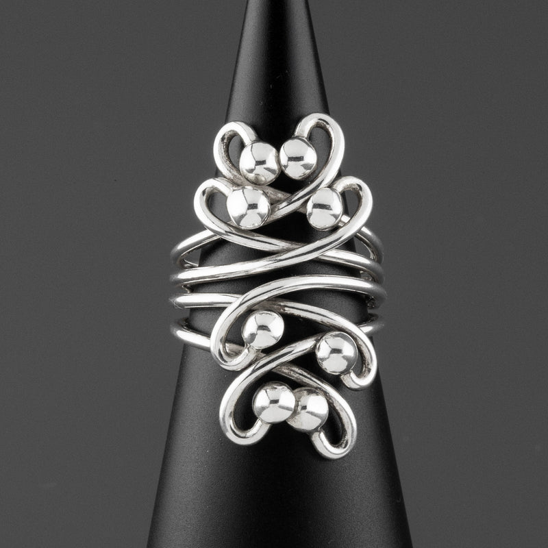 long sterling silver swirl statement ring