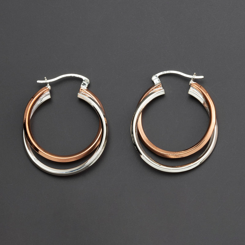 mixed signals silver and copper hoop earrings