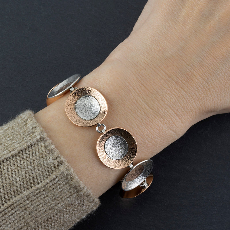 sterling silver and copper circle bracelet