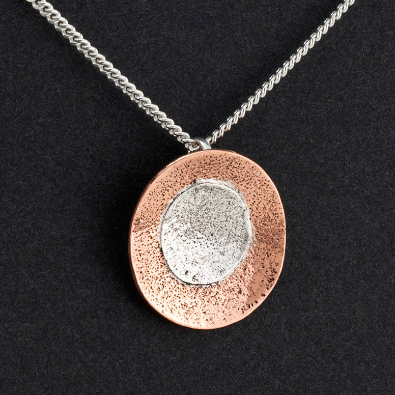 orbit silver and copper pendant necklace