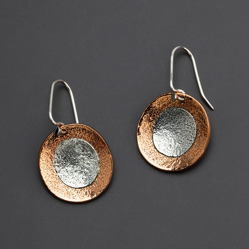 orbit textured silver and copper earings
