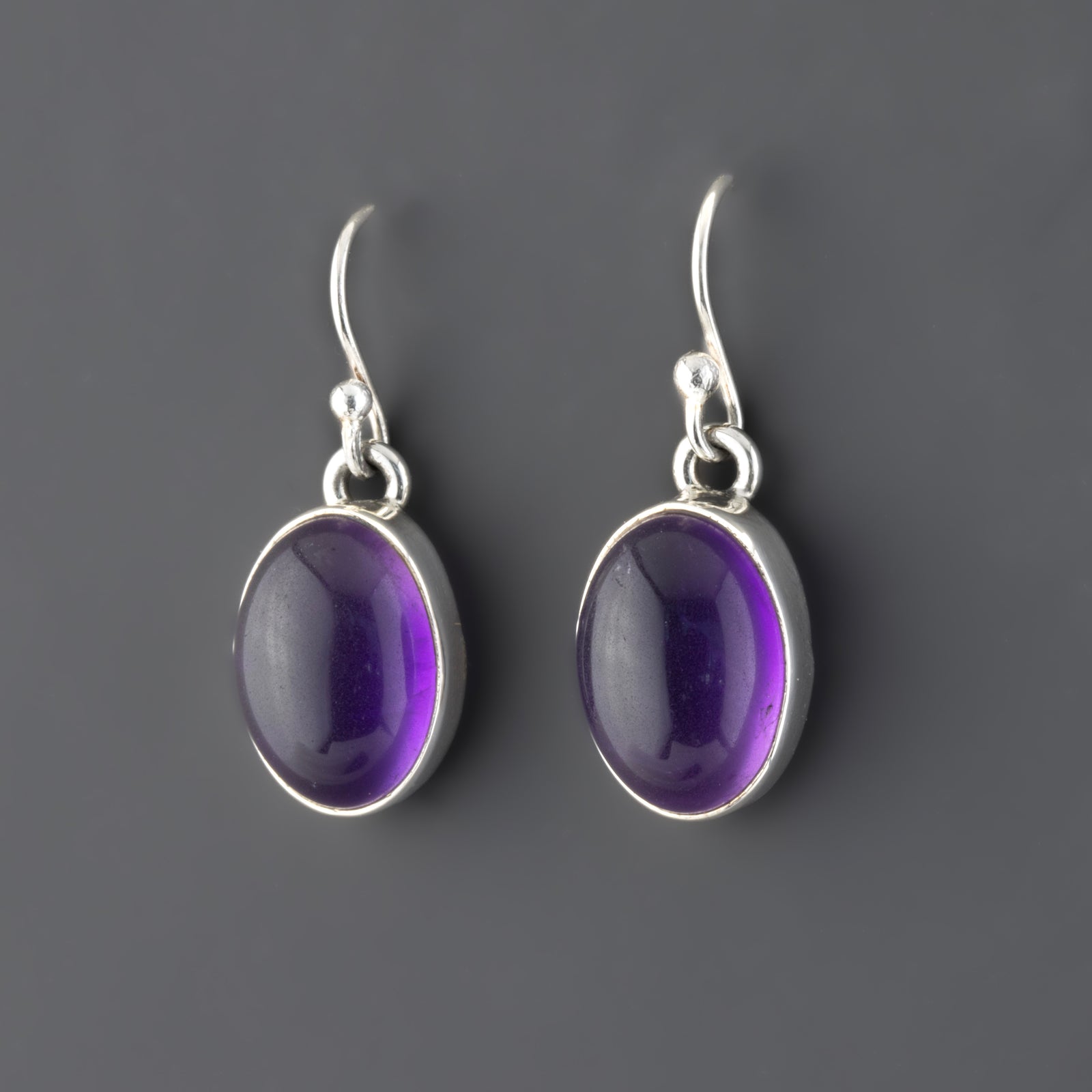 oval genuine amethyst dangle earrings