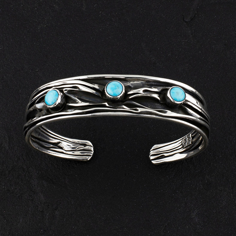 oxidized Taxco silver and turquoise corrugated cuff bracelet