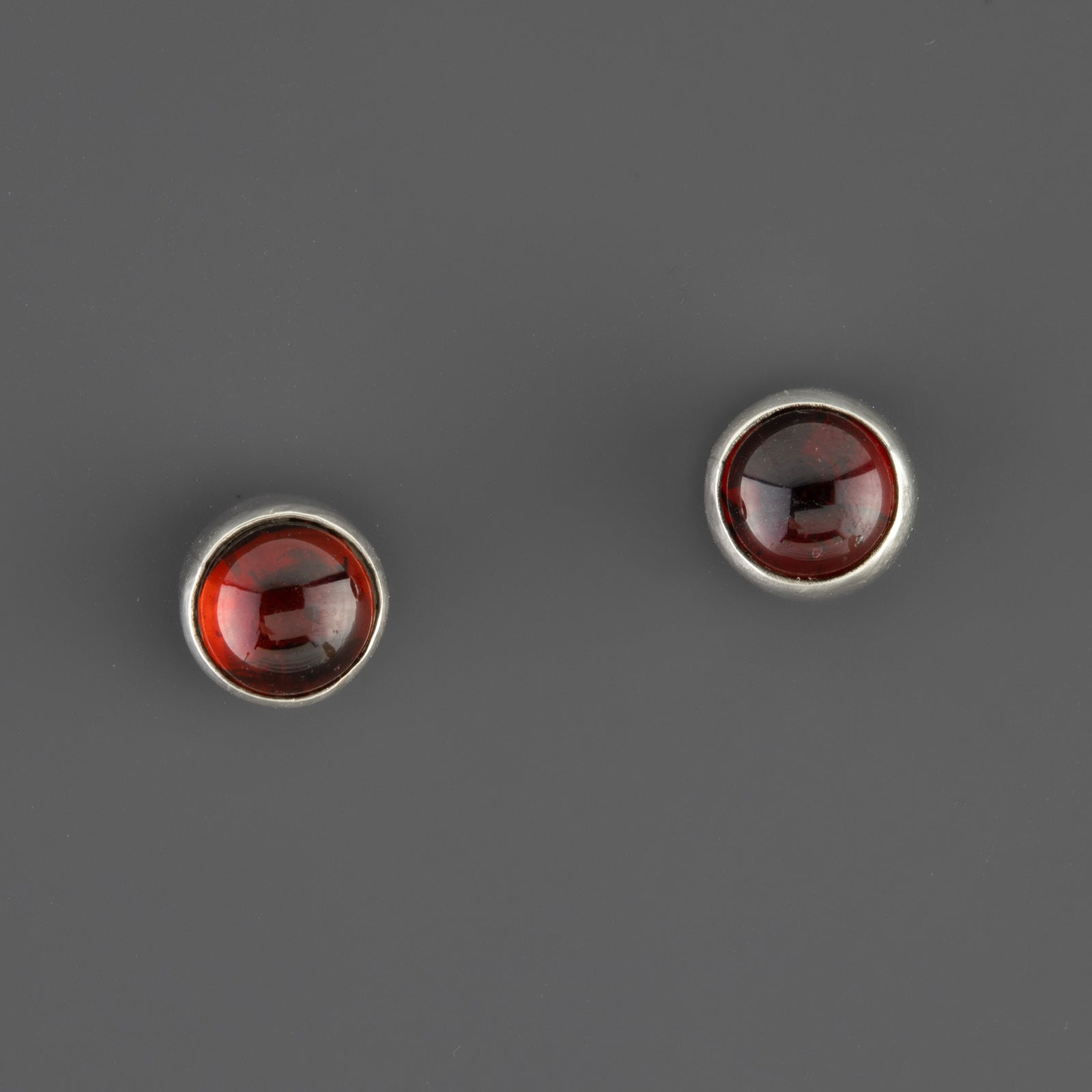 petite garnet silver stud earrings