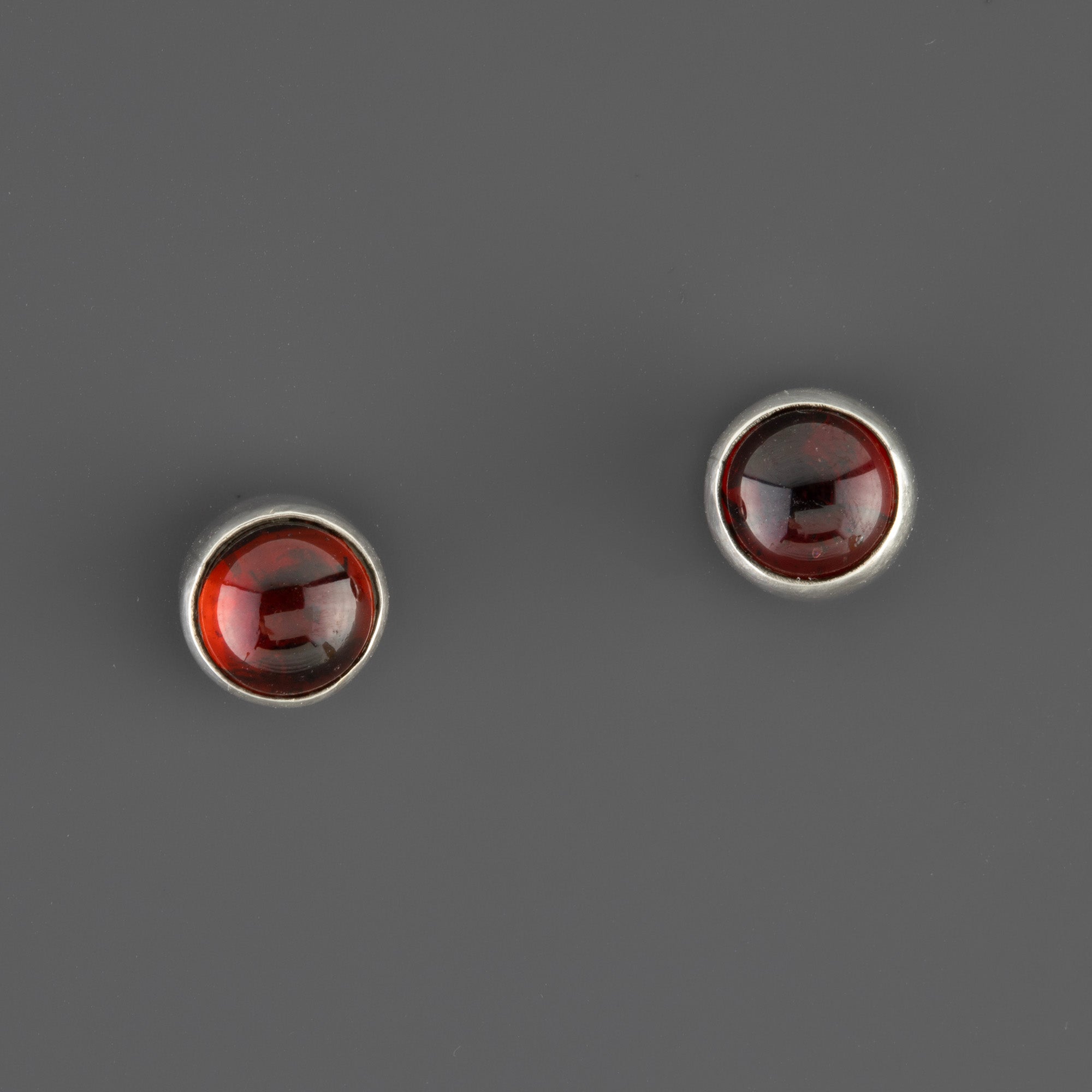 petite garnet silver stud earrings