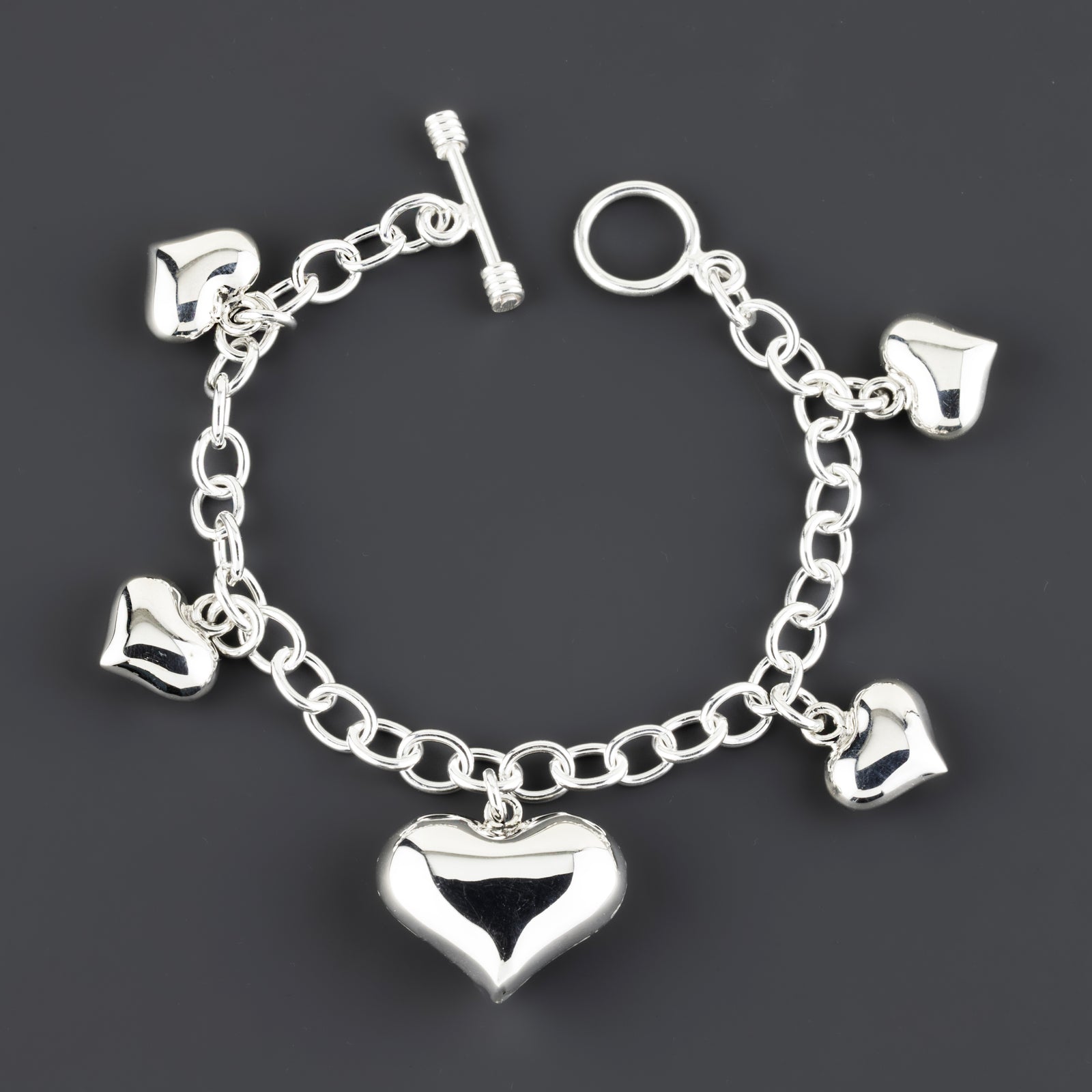 puffed hearts multi charms sterling silver bracelet