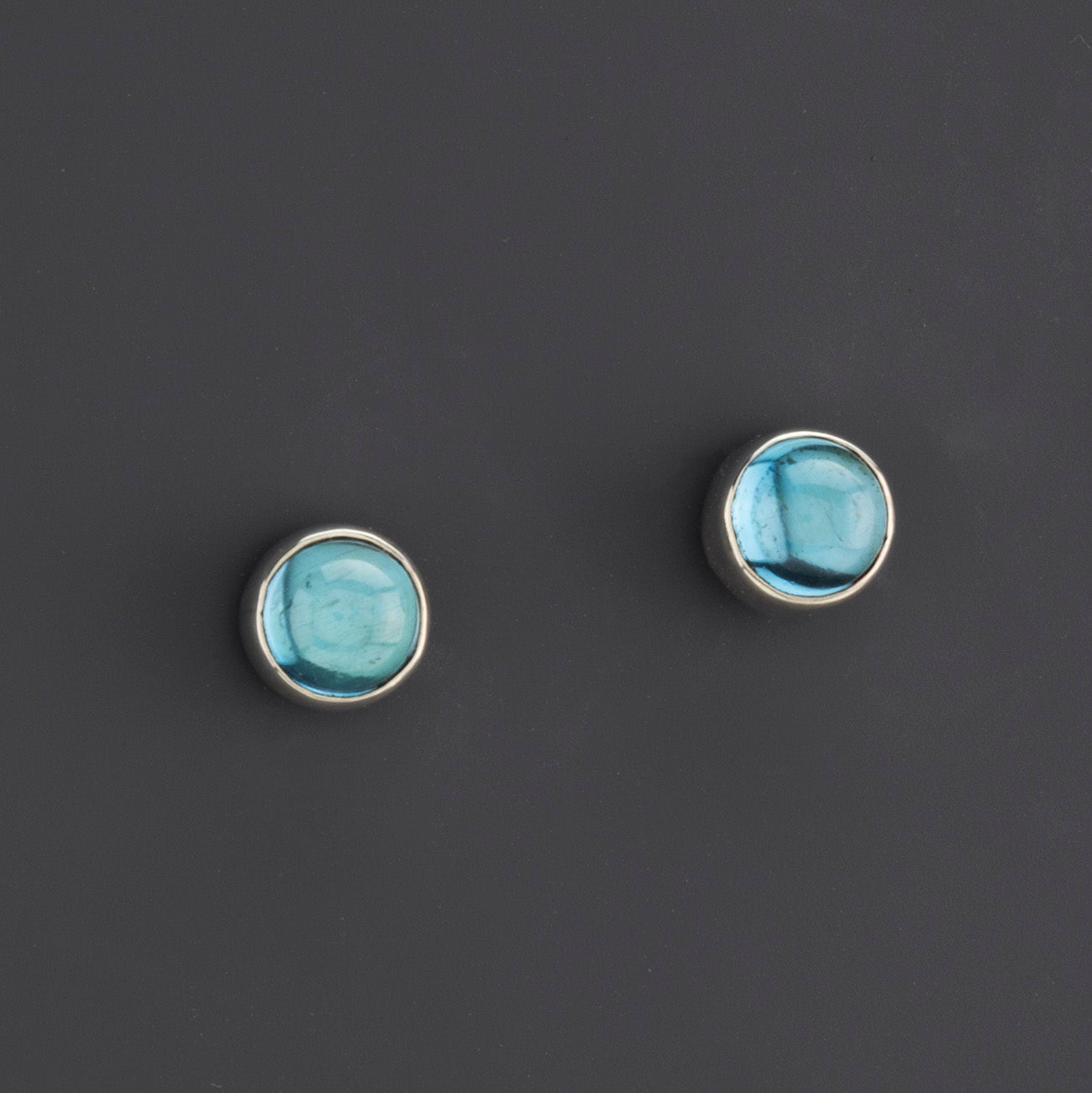 round blue topaz sterling silver stud earrings