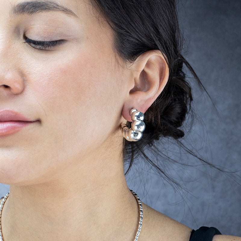 sculpted puff chunky silver hoop earrings