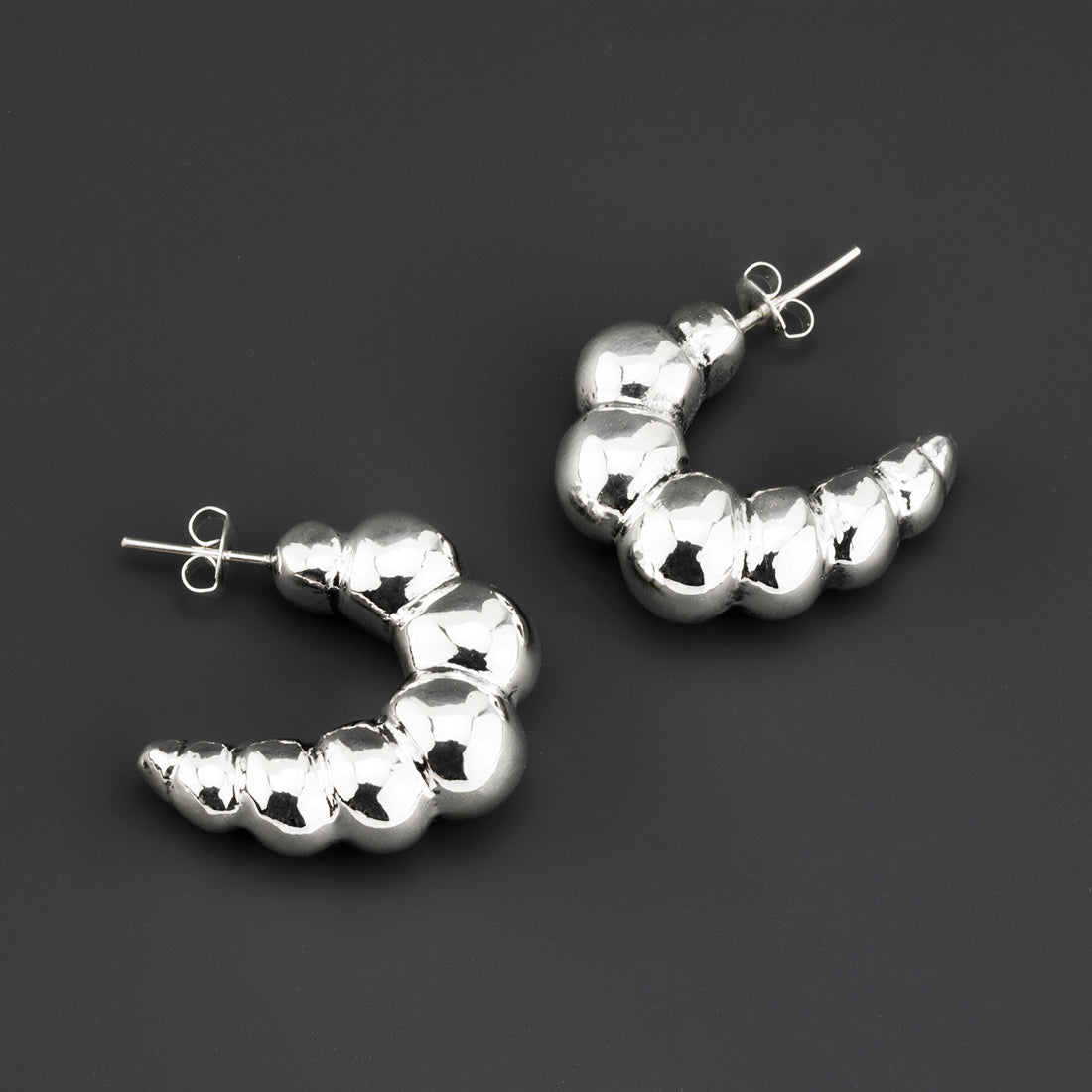 sculpted puff chunky silver hoop earrings